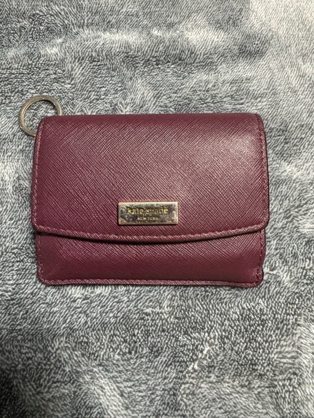 kate spade Maroon Saffiano Leather Fold Wallet with Gold Plaque